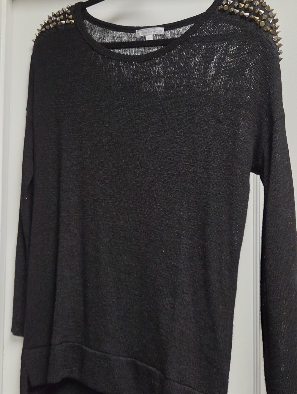 Studded black sweater